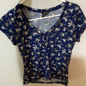 dark blue top with small flowers